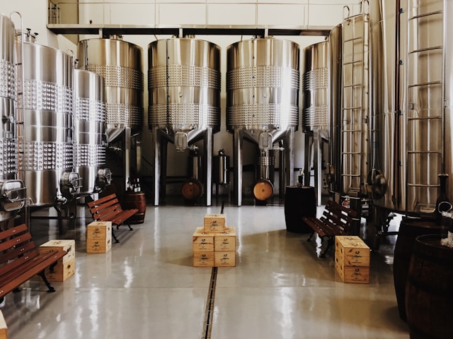 Insight 1 Stainless steel beverage processing tanks in a production facility